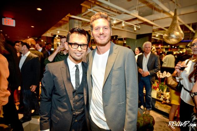 Erwin Gomez and Spike Mendelsohn at the center of the party during last night's grand opening celebration for Karma Beauty Lounge.
